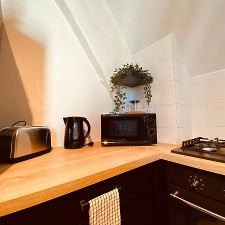 Under Roof Apartment *